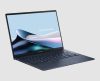 Asus ZenBook 14 OLED UX3405MA in Ponder Blue, three-quarter side view showing the keyboard and ports